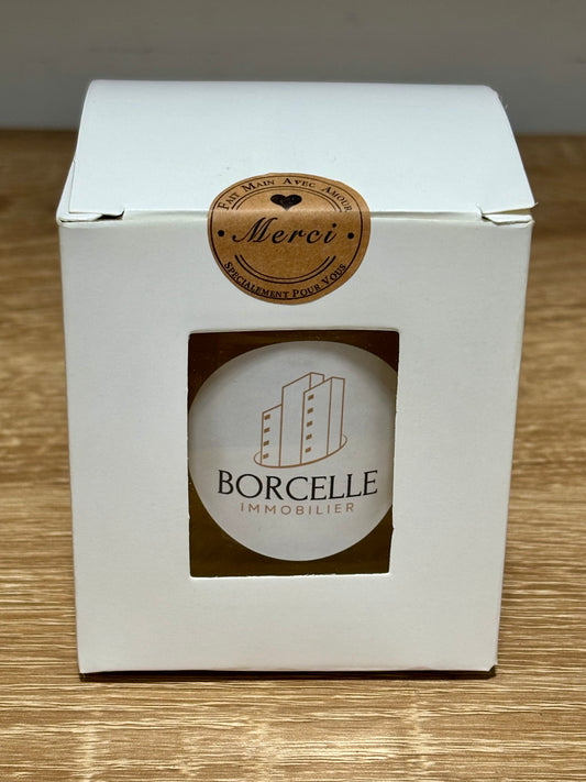 Petit pot de miel personnalisé en coffret cadeau individuel avec étiquette Borcelle Immobilier et sticker Merci.