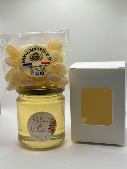 Pot de miel personnalisé de 250g avec sachet de bonbons au miel et boîte cadeau blanche pour un mariage au nom d'Ophélie et Valentin le 27 juin 2026