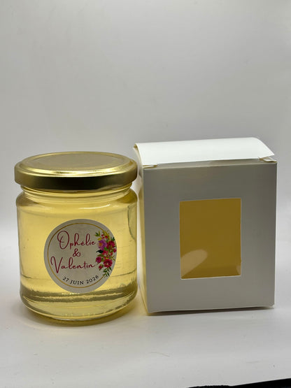 Pot de miel de 250g avec étiquette personnalisée des nom et accompagné de sa boîte cadeau blanche